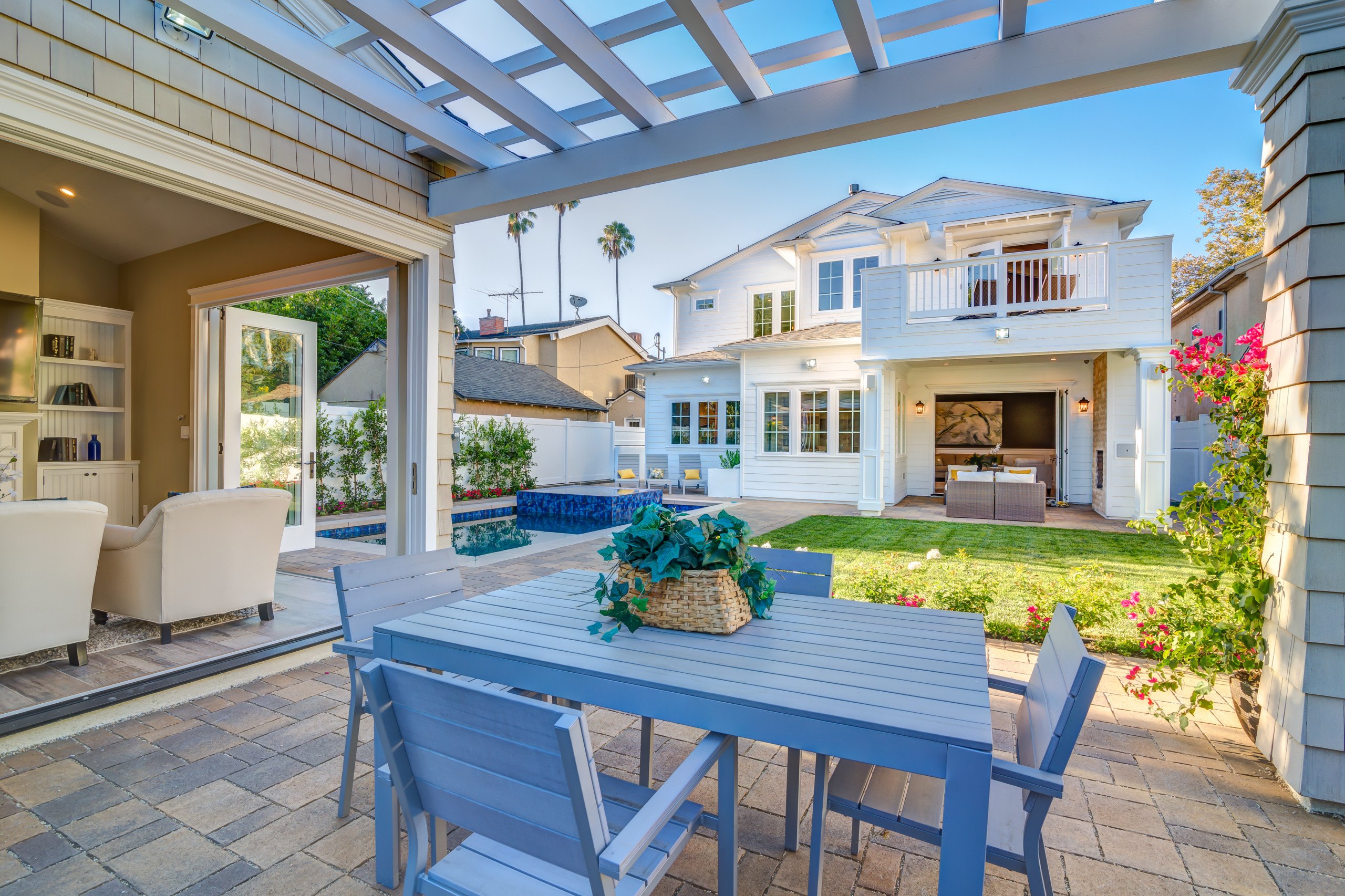 The covered loggia of the Studio City residence looking back at the house across the garden.